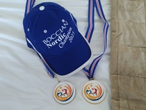 PM-mitalit ja lippis